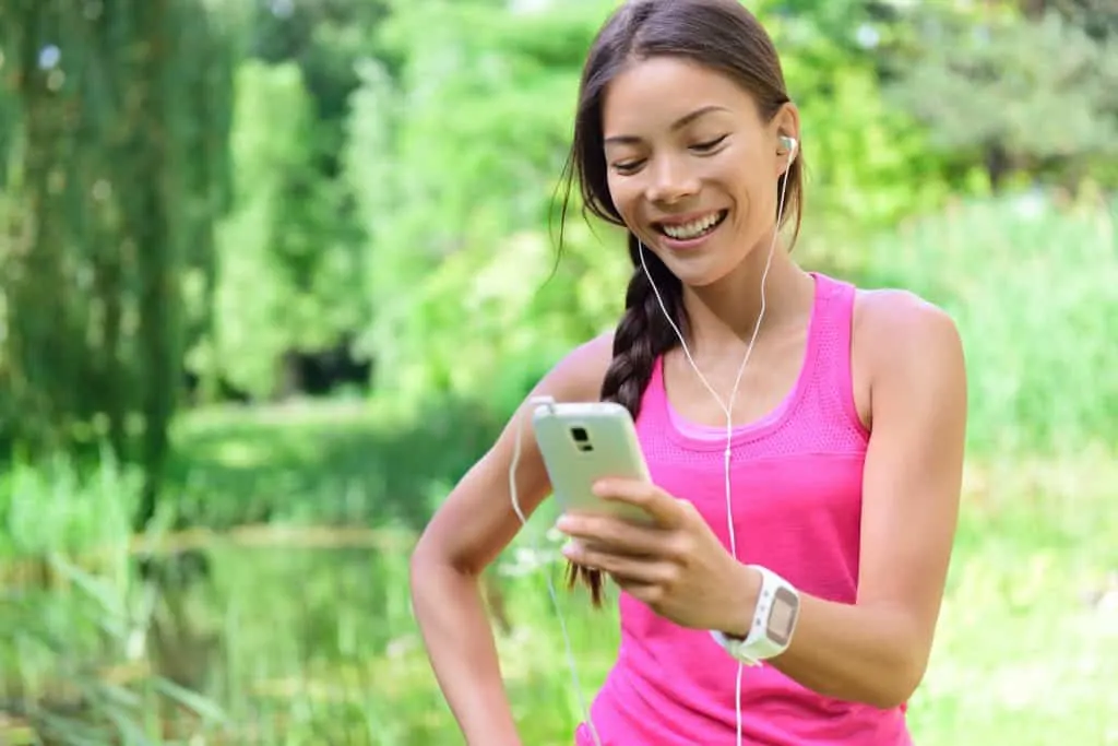 Woman listening to music before tennis match