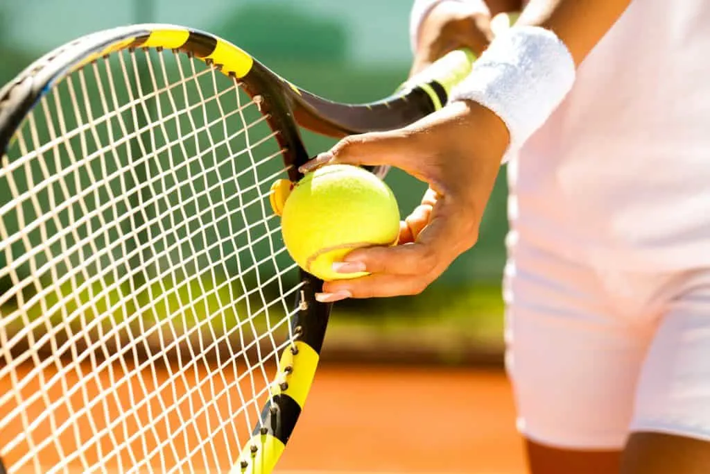 Preparing to serve in tennis